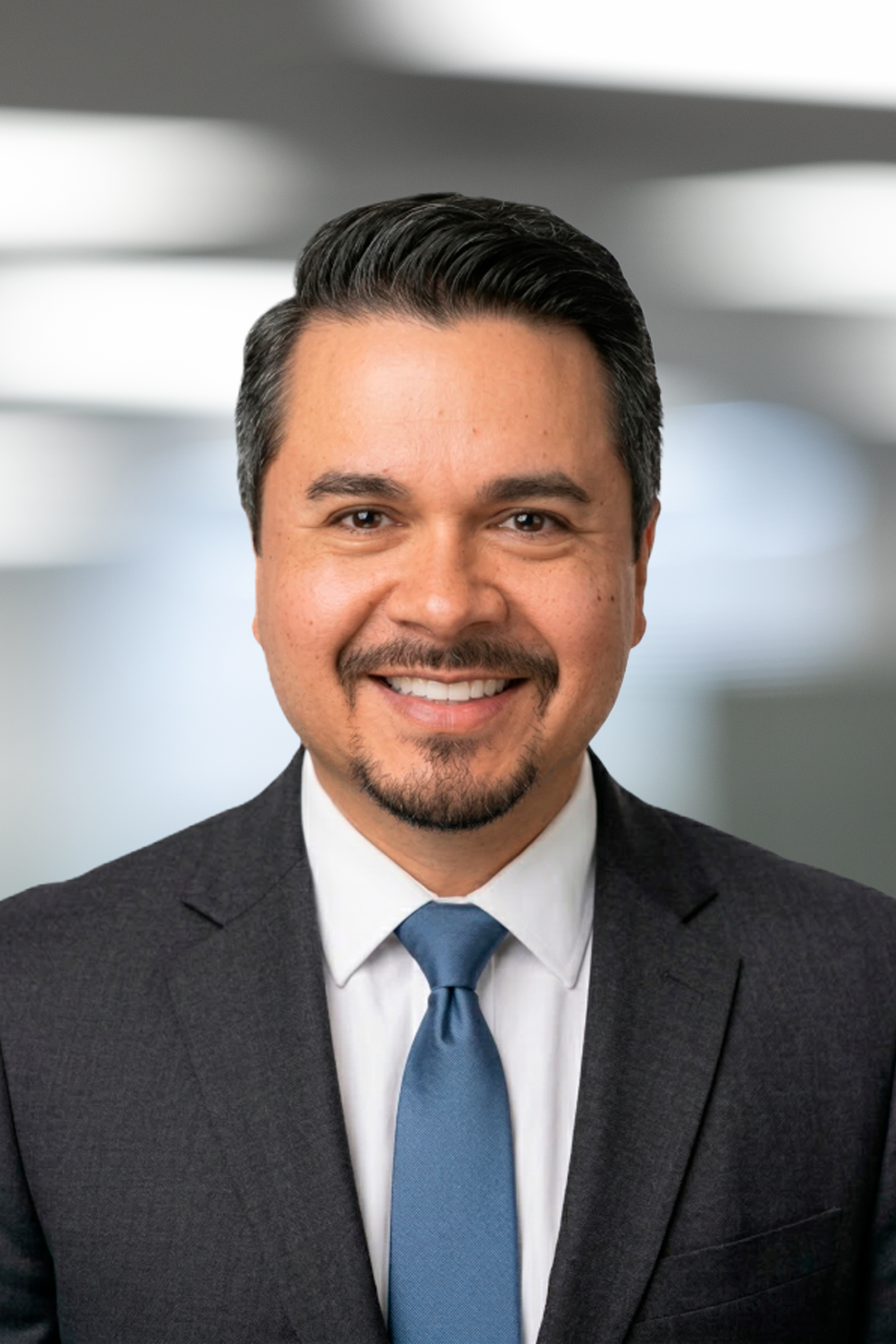 Corporate headshot Julio Rodriguez